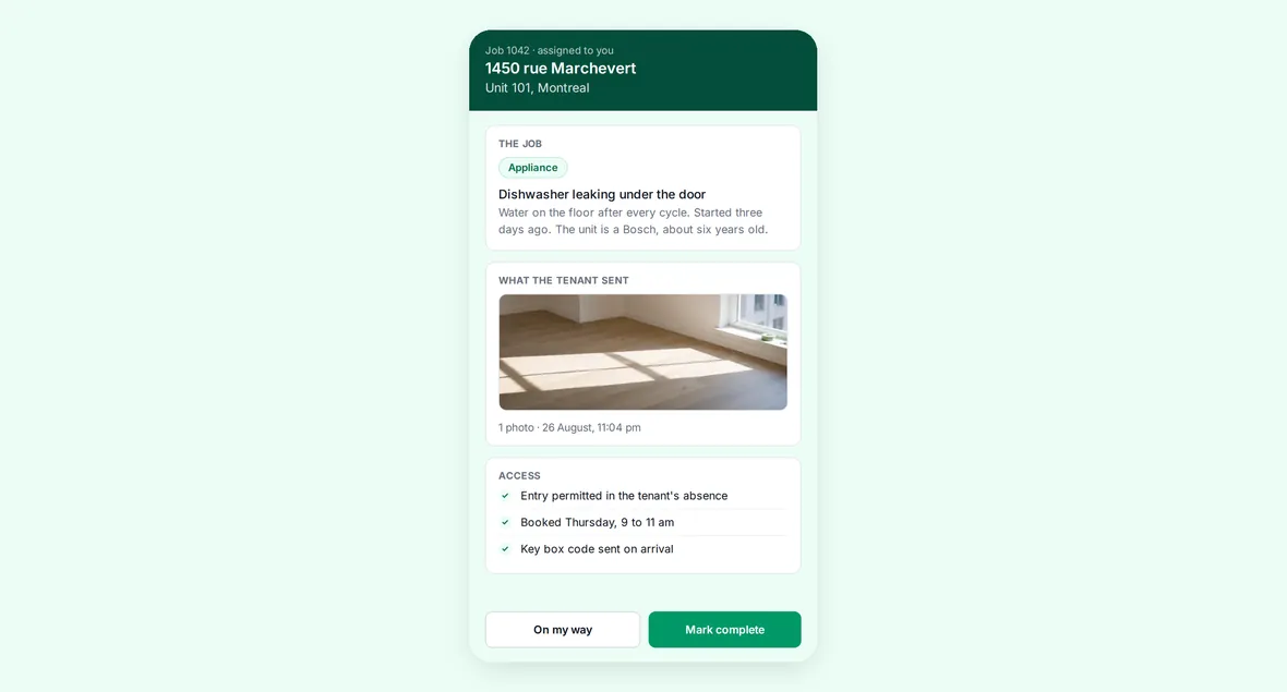 The contractor's phone: the job with the address and unit, the issue described by the tenant, the photo the tenant attached, and confirmation that entry is permitted in the tenant's absence, with a button to mark the work complete.